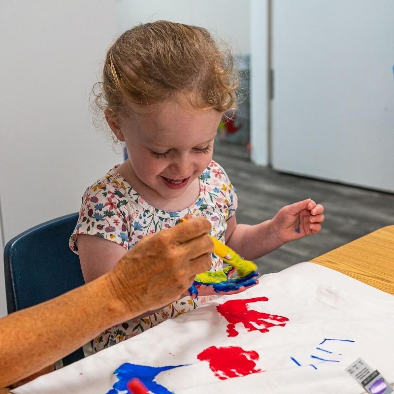 Private School Pre-K student painting in Albany, NY