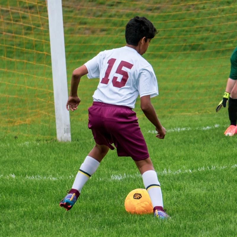 private school students playing soccer for Saint Gregory's School's co-ed soccer team in Albany, NY