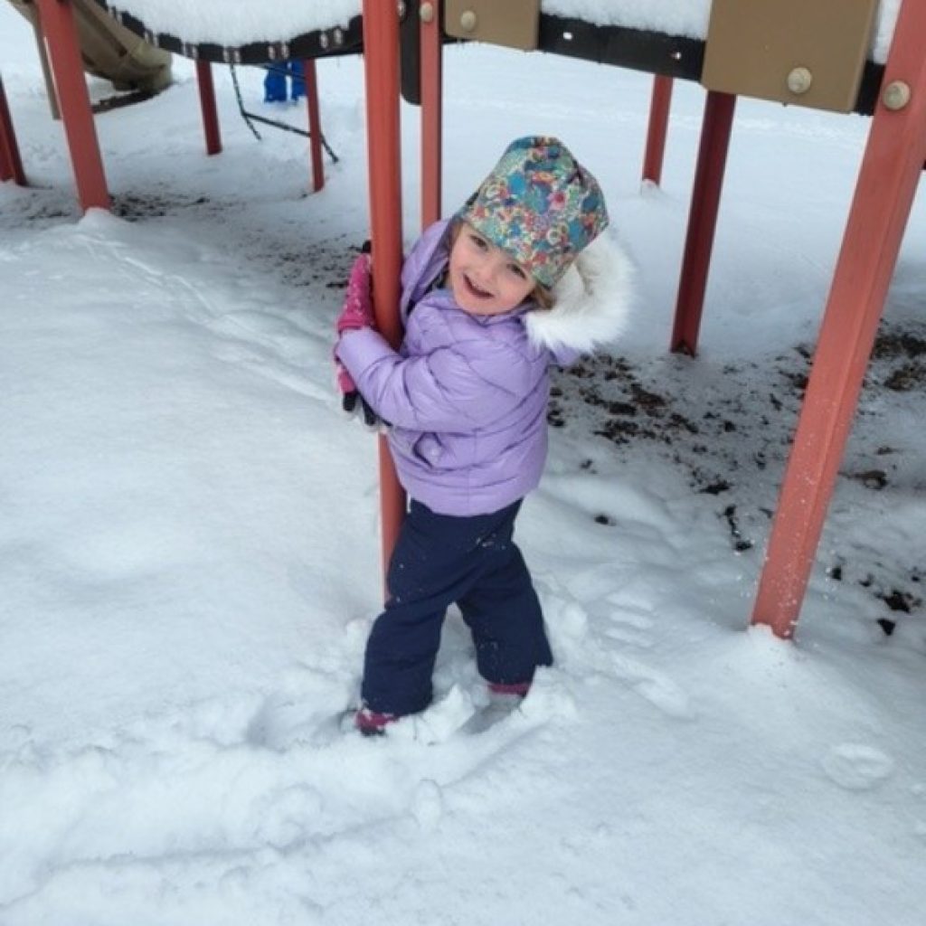 Private School Kindergartener playing in the snow on the Saint Gregory's School Campus in Albany, NY