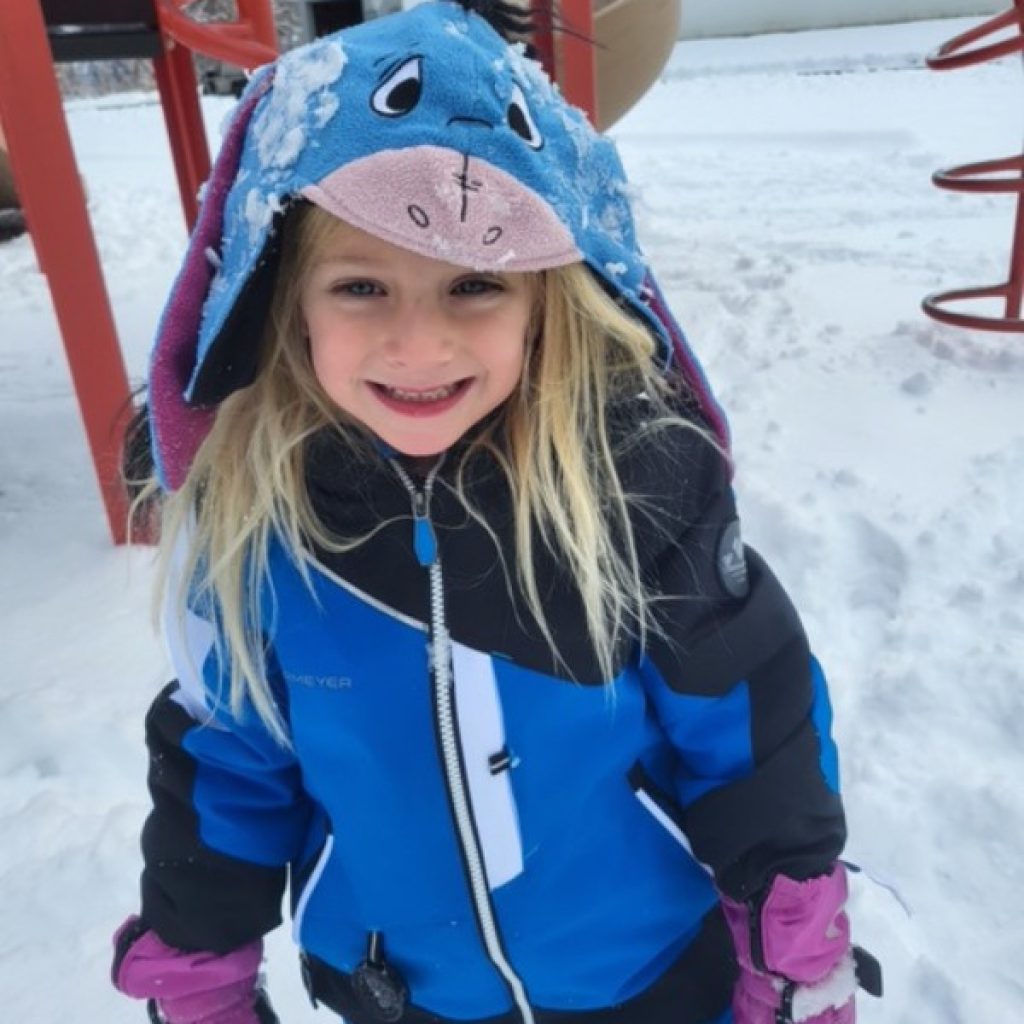 Private School Kindergartener playing in the snow on the Saint Gregory's School Campus in Albany, NY