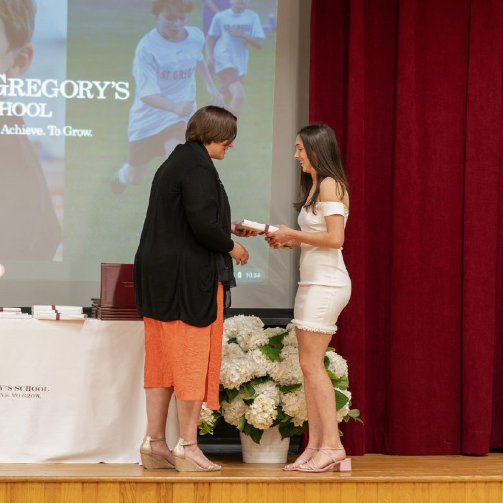 private school 8th grader receiving the Excellence in Music award at her graduation