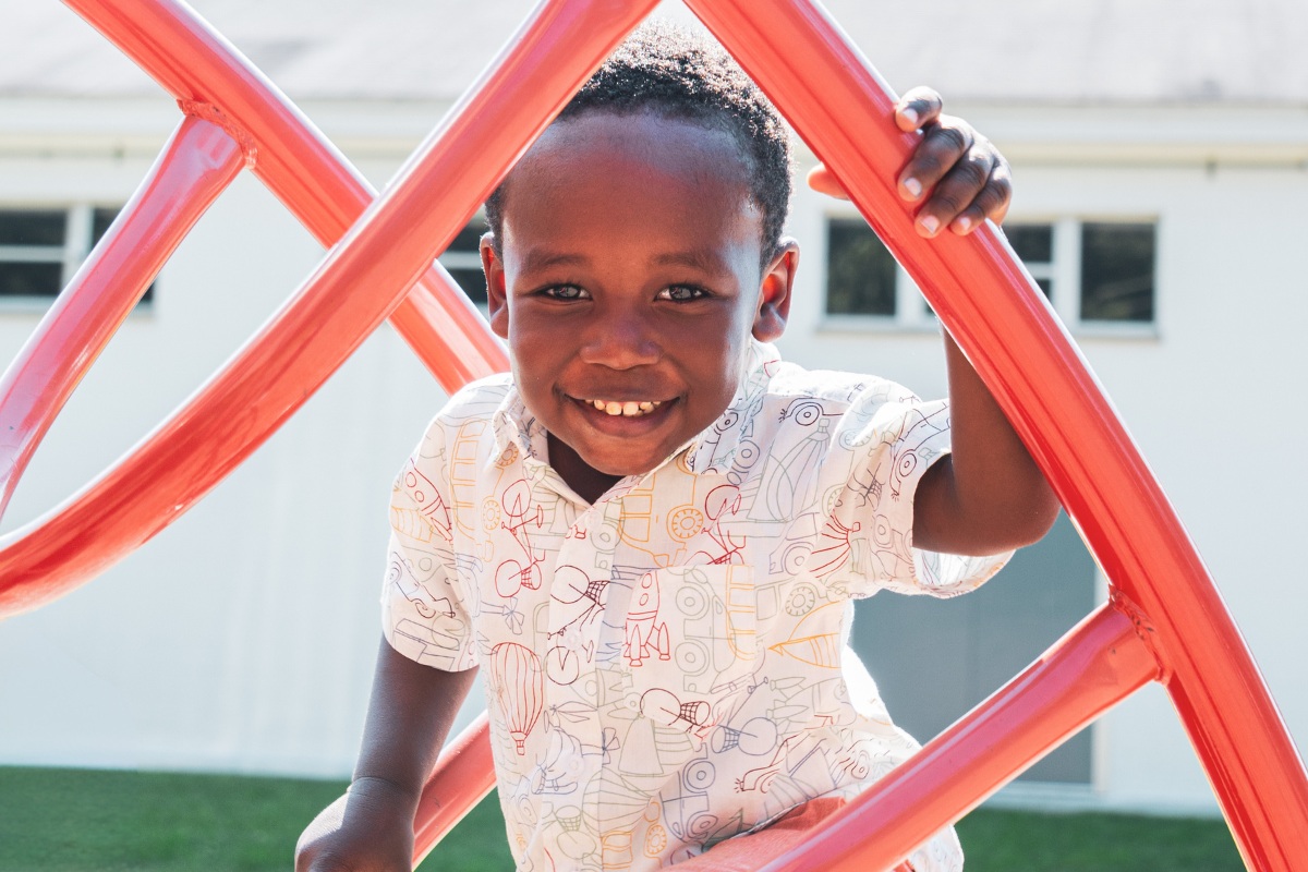 Pre-Kindergarten student playing at the monkey bars at Saint Gregory's School in Albany, NY