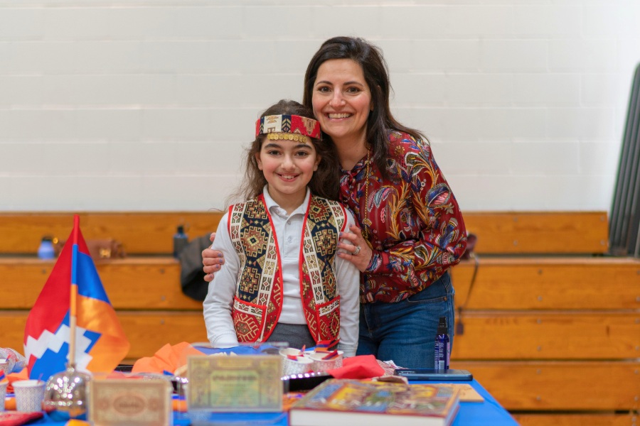 Saint Gregory's School student Jackie represents Armenia together with her mom at the second annual multicultural fair at SGS