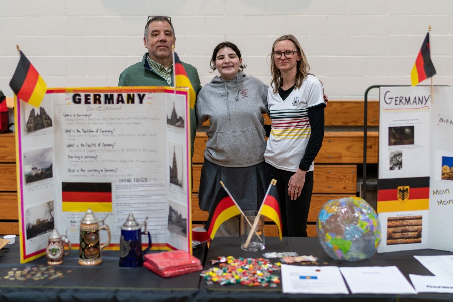 Saint Gregory's School student Meave and Lower School teacher Mrs. Smith represent Germany at the second annual multicultural fair at SGS