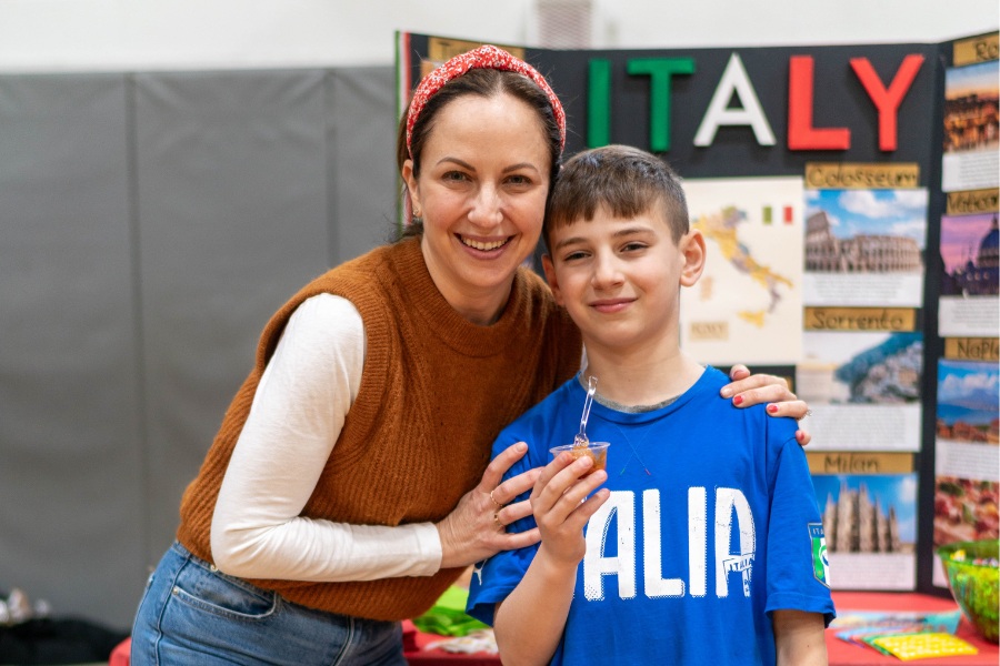 Saint Gregory's School student Vince represents Italy together with his mom at the second annual multicultural fair at SGS