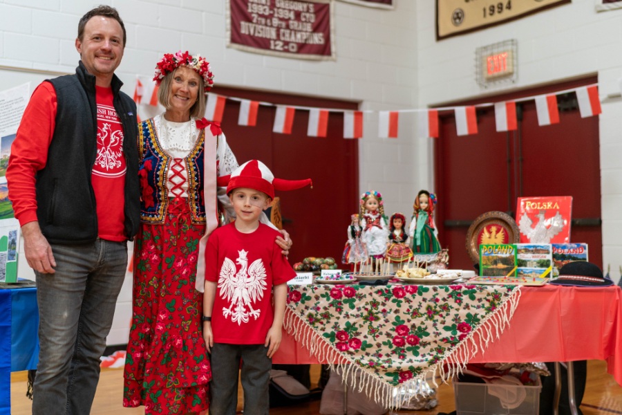 Saint Gregory's School student Leo represents Poland together with his dad and grandmother at the second annual multicultural fair at SGS