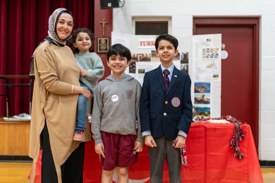 Saint Gregory's School students Eren and Emre represent Turkey together with their mom at the second annual multicultural fair at SGS