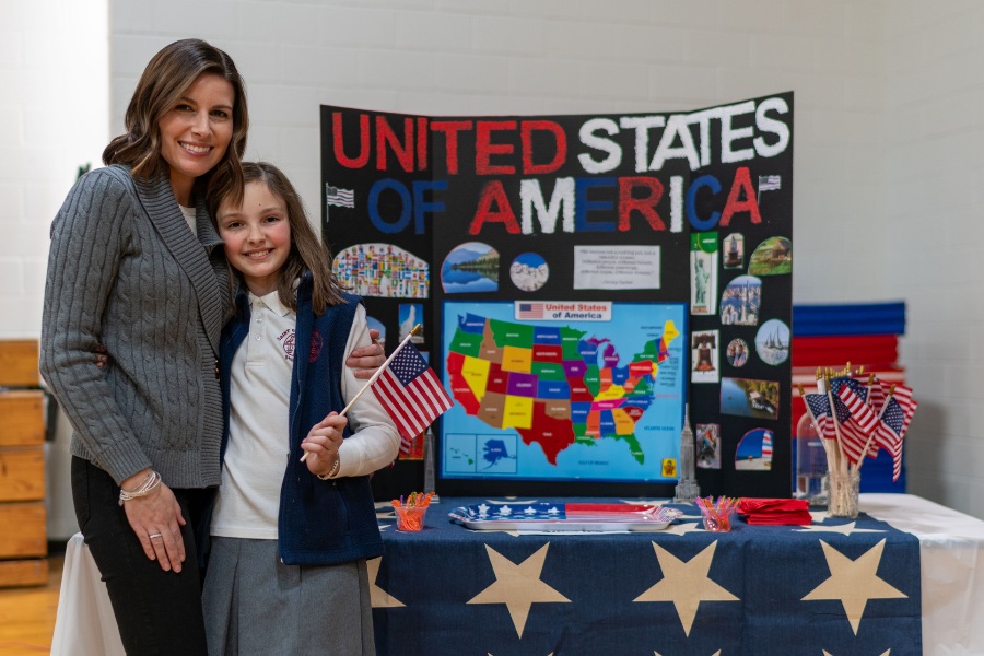 Saint Gregory's School student Kira represents the US together with her mom at the second annual multicultural fair at SGS