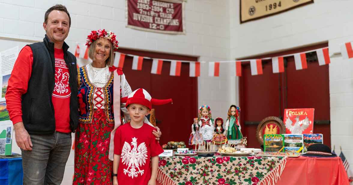 Saint Gregory's School 2nd grader Leo represents Poland together with his dad and grandmother at the second annual multicultural fair at SGS