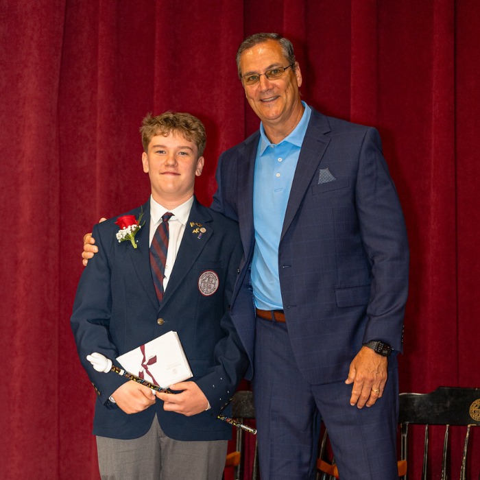 SGS private school student Austin receiving Most Improved Award