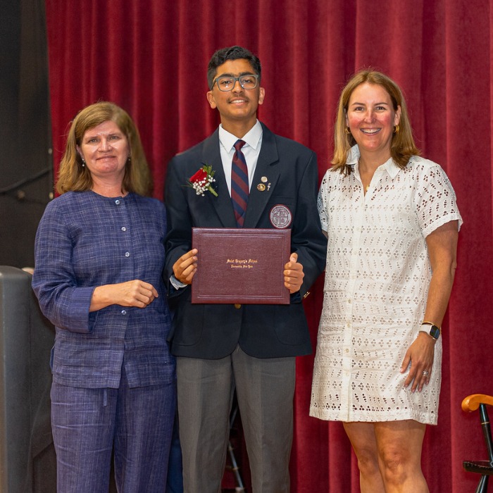 SGS student Ayaan receiving his diploma