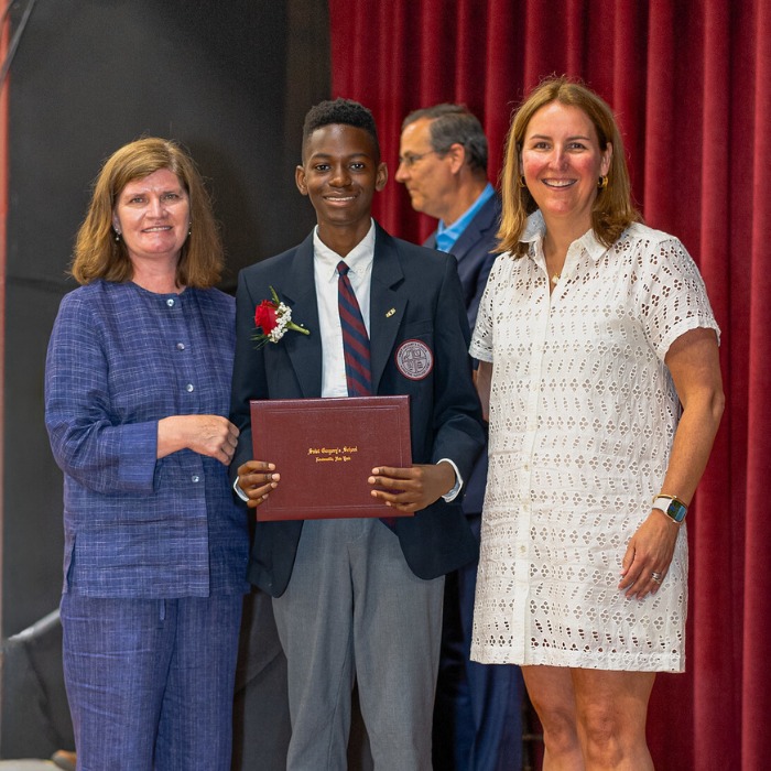 SGS student CJ receiving his diploma