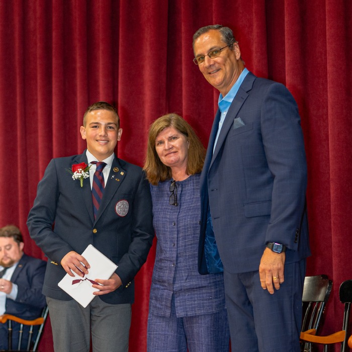 SGS private school student Evan receiving the Faculty Award for Academic Excellence