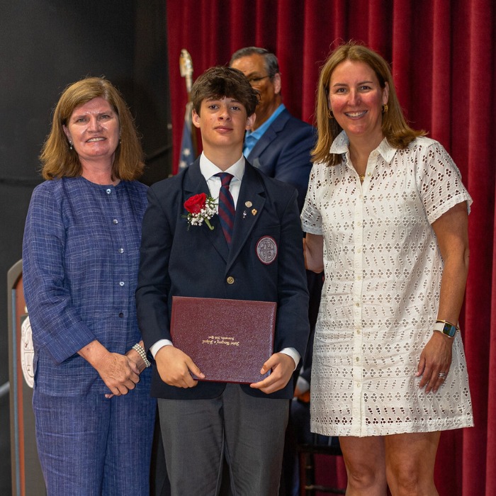 SGS student Peter receiving his diploma