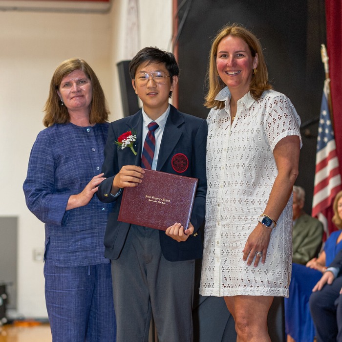 SGS student Tao receiving his diploma