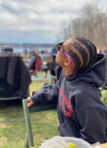 private school 8th grader Jaiden observes the solar eclipse in 2024