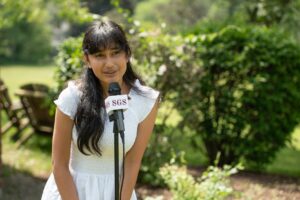 What do you guys want to be when you grow up (1) Saint Gregory's graduating 8th Grader Izzy is answering questions from the 5th grade, reflecting on her time at SGS